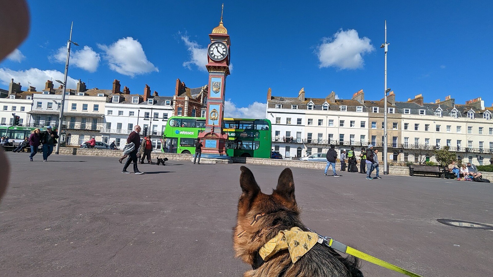 The colourful Jubilee Clock on Weymouth Esplanade with Georgian terraces behind