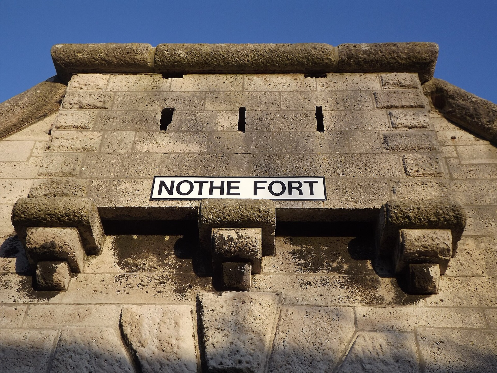 The stone entrance of Nothe Fort, Weymouth