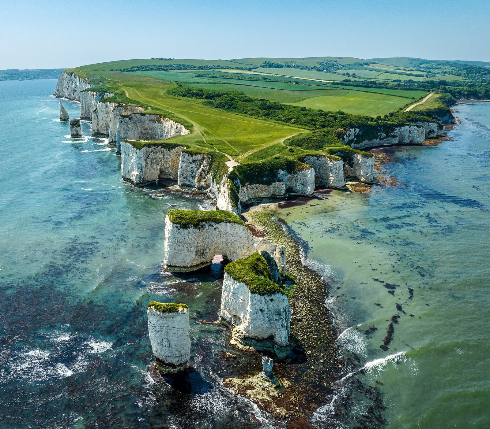 Old Harry Rocks, white chalk stacks off Handfast Point, from the air
