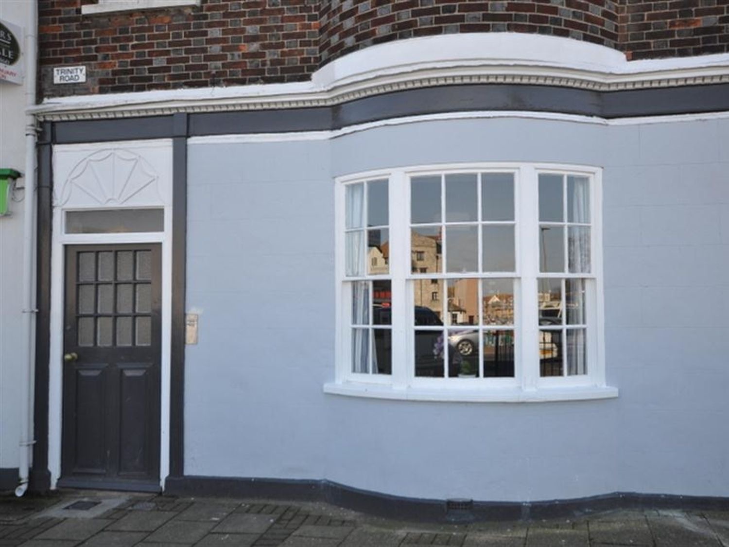 Waterside's front door and bay window on Trinity Road