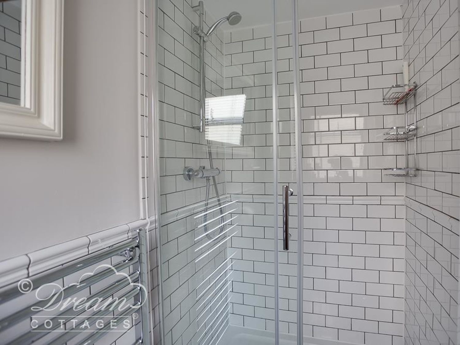 En-suite shower room at Waterside with white metro tiles